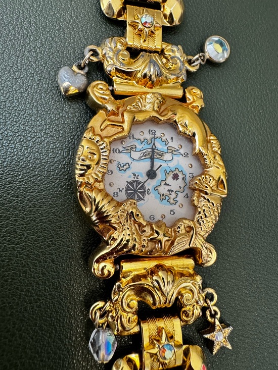 Kirks Folly Accessories - Vintage Kirks Folly Foreverland/ Neverland Charm Bracelet Watch PreOwned READ